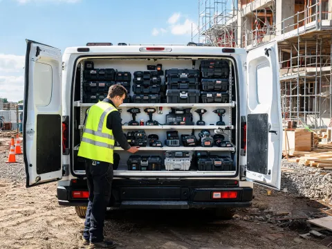 Field specialist checking jobsite tool kits
