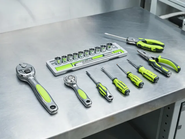 Hand tool set on a steel bench